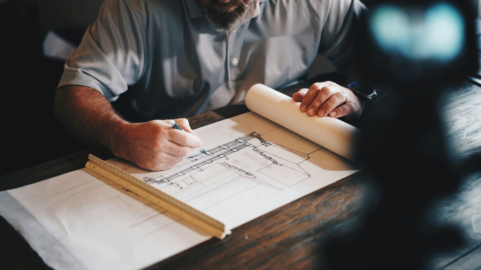 Architect working on a technical drawing